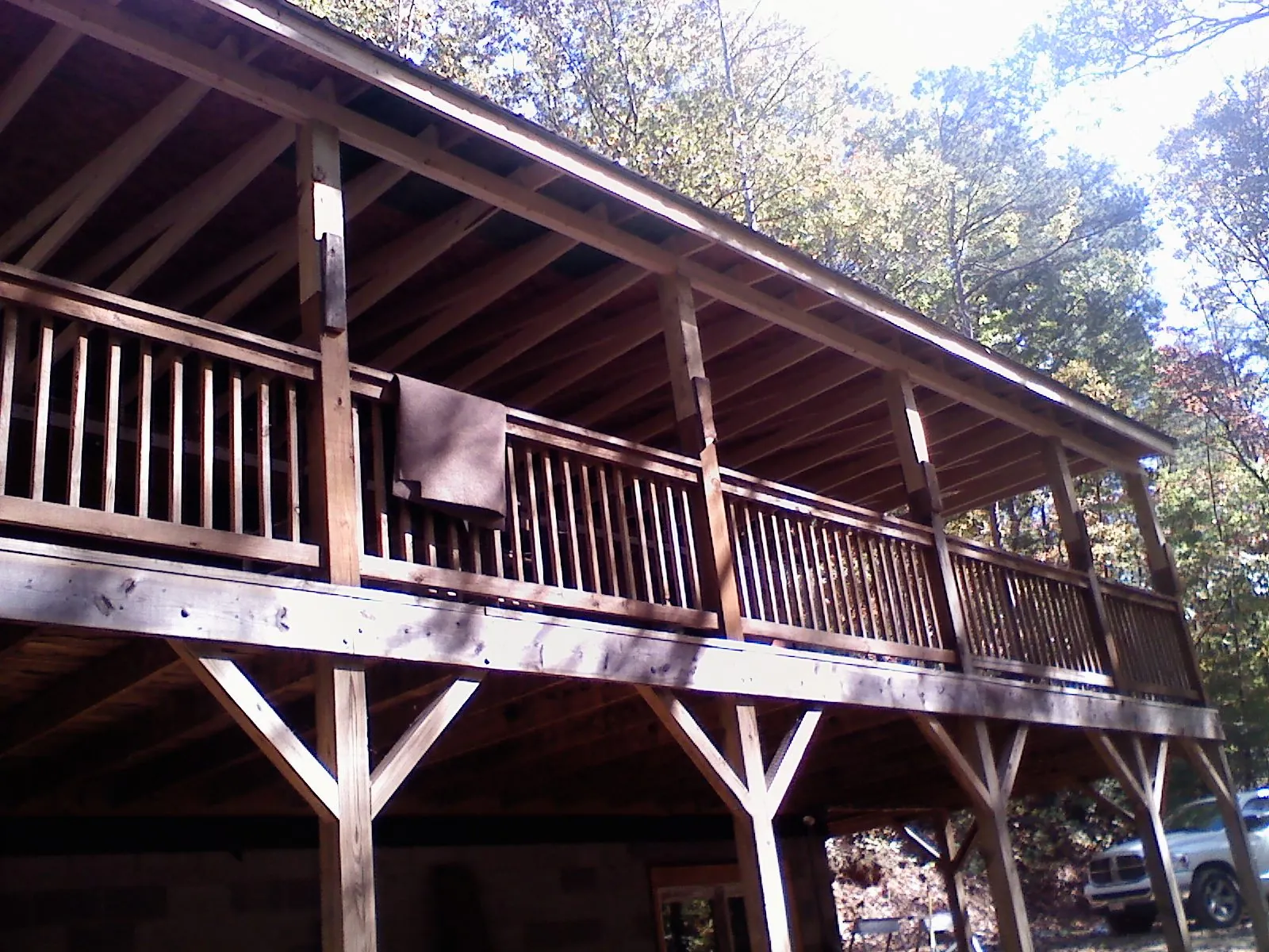 Timber framing under a new elevated porch and deck — Roof Leak Repair in Branchdale by Roofing Brothers